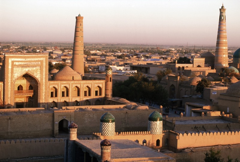 The last rays of the sun as it sets in Old Town Khiva, Uzbekistan. Photo credit: Peter Guttman