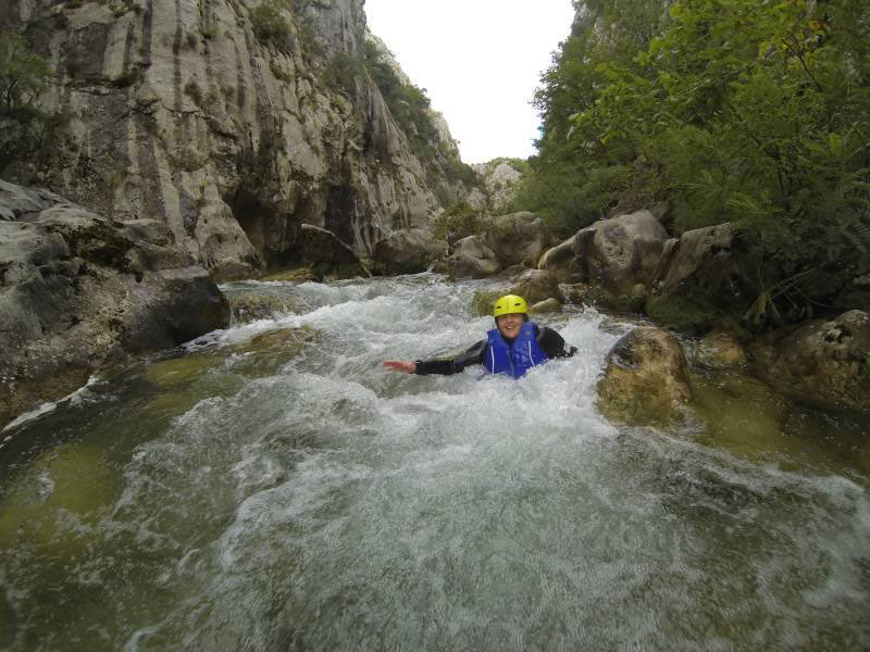 MIR Private Journeys Specialist Lisa Peterson goes canyoning in the Cetina River near Split, Croatia. Photo credit: Lisa Peterson