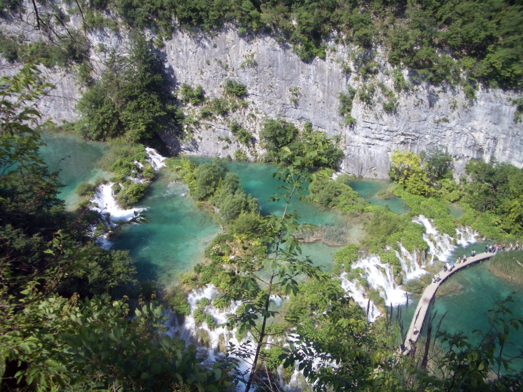 Plitvice National Park is a series of 16 stunning interlinked lakes amid forested mountains in Croatia. Photo credit: Lisa Peterson