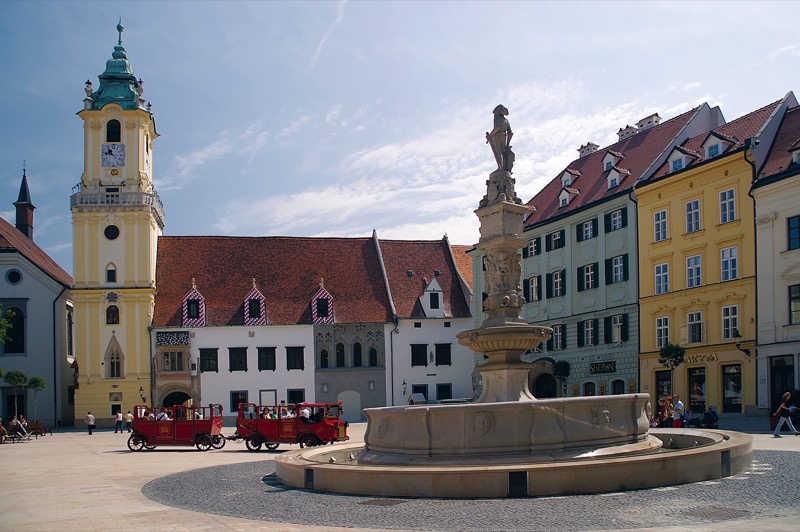 Old Town Hall and the elegant Maximilian Fountain flank Hlavné Námestie Square in Bratislava, Slovakia. Photo credit: Jan Lacika