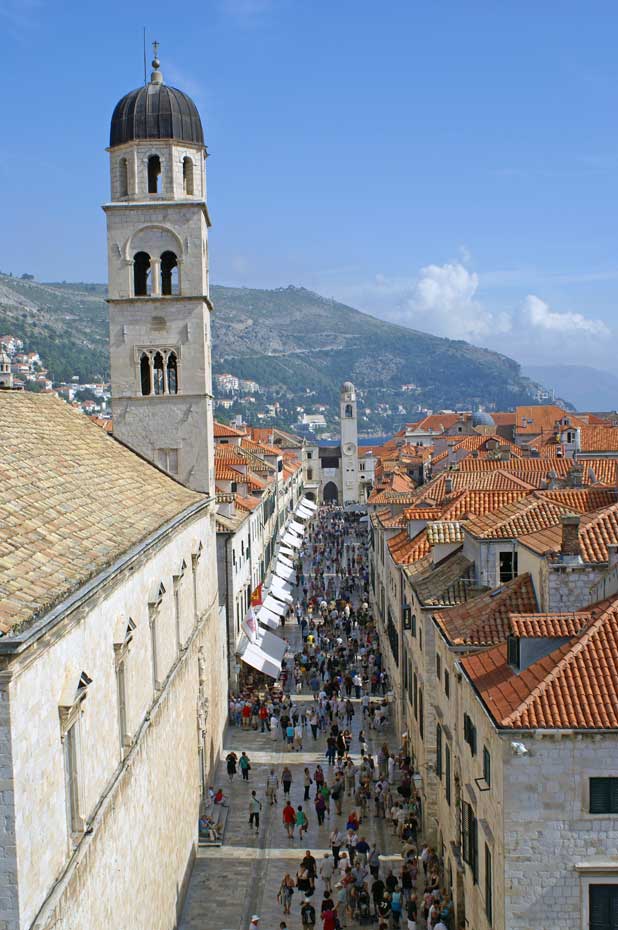 Stradun is Dubrovnik's main street – wide by the Old Town's standards – with bell towers at each end of the quarter-mile pedestrian walkway. Photo credit: Douglas Grimes