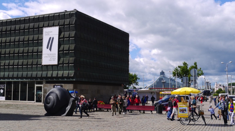 The Museum of Occupation stands in stark, sobering contrast to the colorful architecture of Riga’s Old Town Square. Photo credit: Martin Klimenta