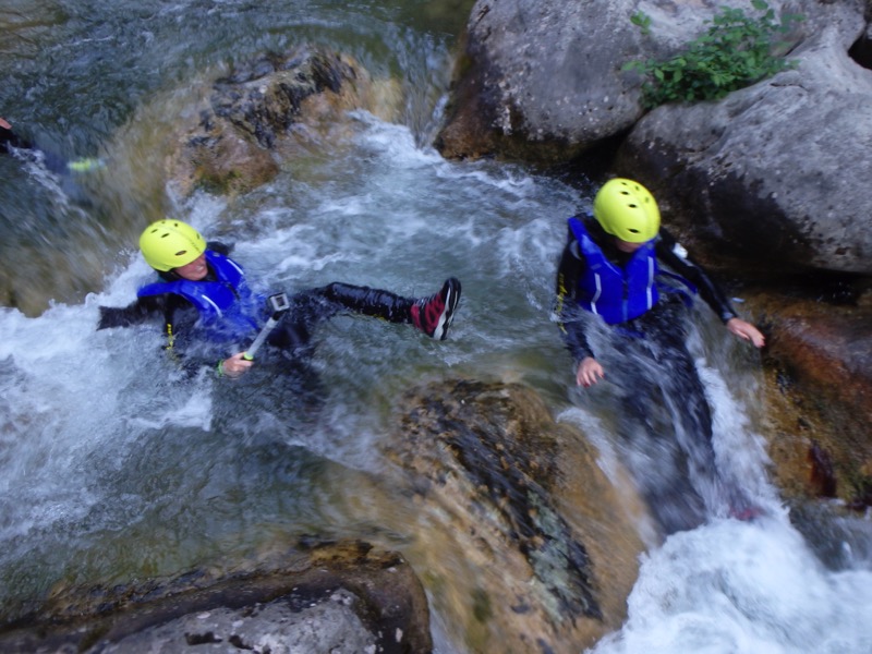 Canyoners go with the flow on the Cetina River. Photo credit: Iris Adventures