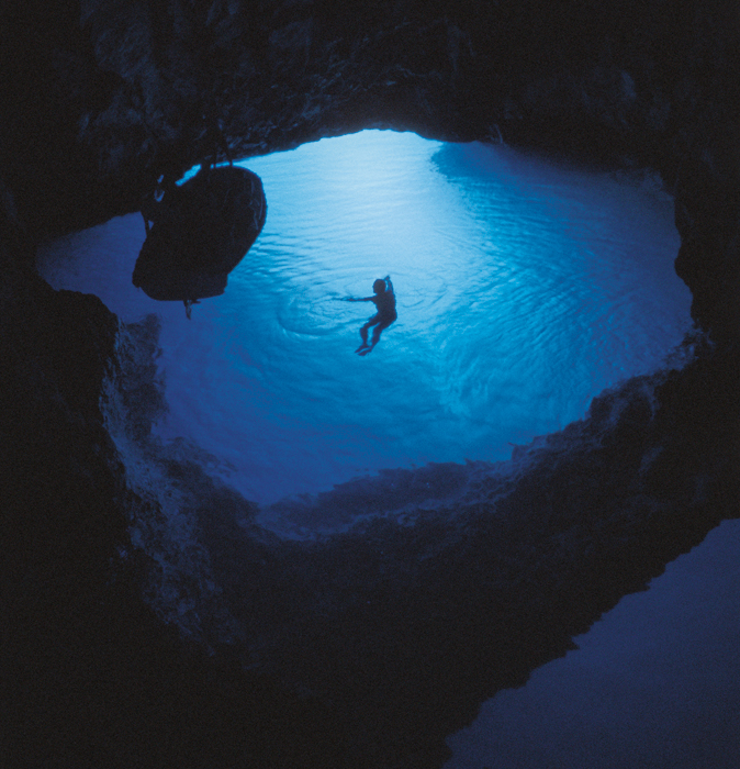 Floating inside the Blue Cave in Bisevo, Croatia. Photo credit: Croatian Tourist Board / Ivo Pervan
