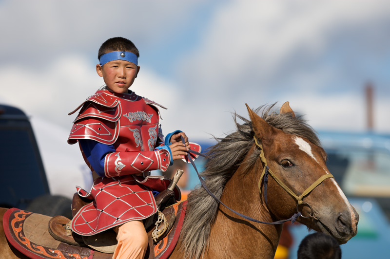 Young rider at Naadam Festival in Ulaanbaatar, Mongolia. Photo credit: Helge Pedersen