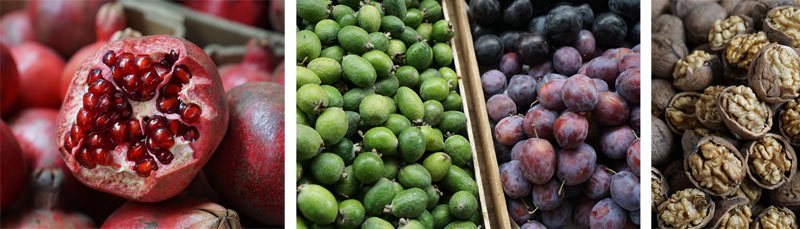 Colorful displays of fruits and nuts at the Green Market. Note the green feijoa in the middle (Baku, Azerbaijan.) Photo credit: Jake Smith