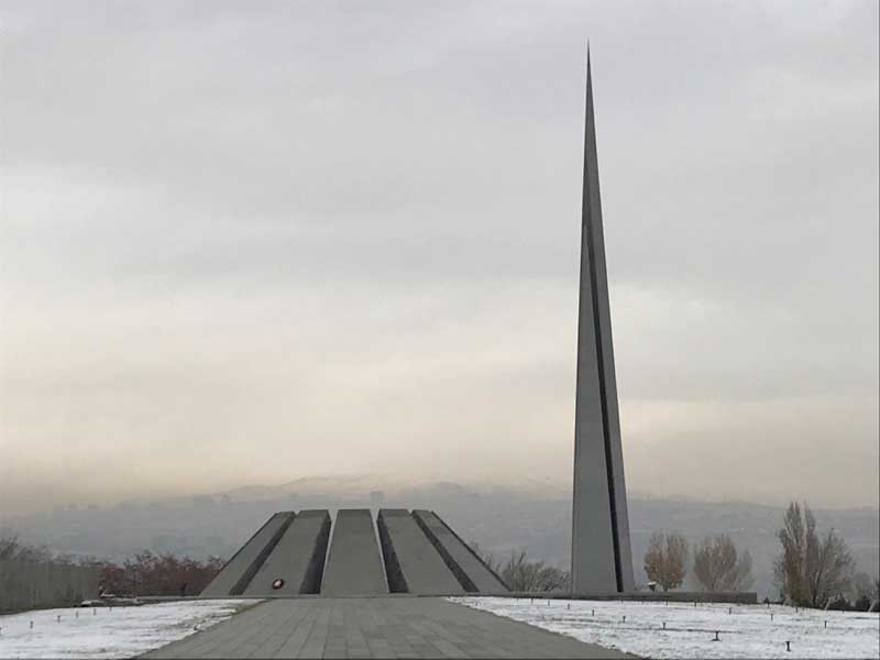 The memorial is flanked by a 44-m stone pillar, a symbol of Armenia’s rebirth. Photo credit: Jessica Clark