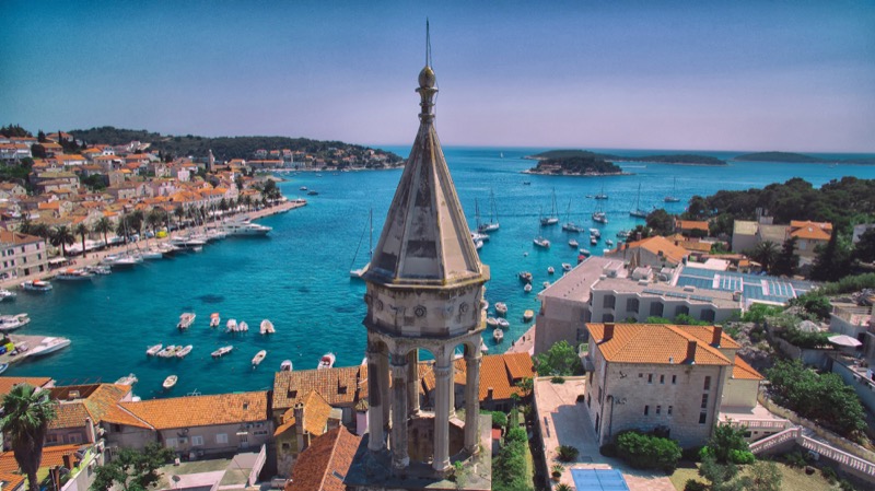 A panoramic view of Hvar and its turquoise harbor. Photo credit: Croatian National Tourist Board