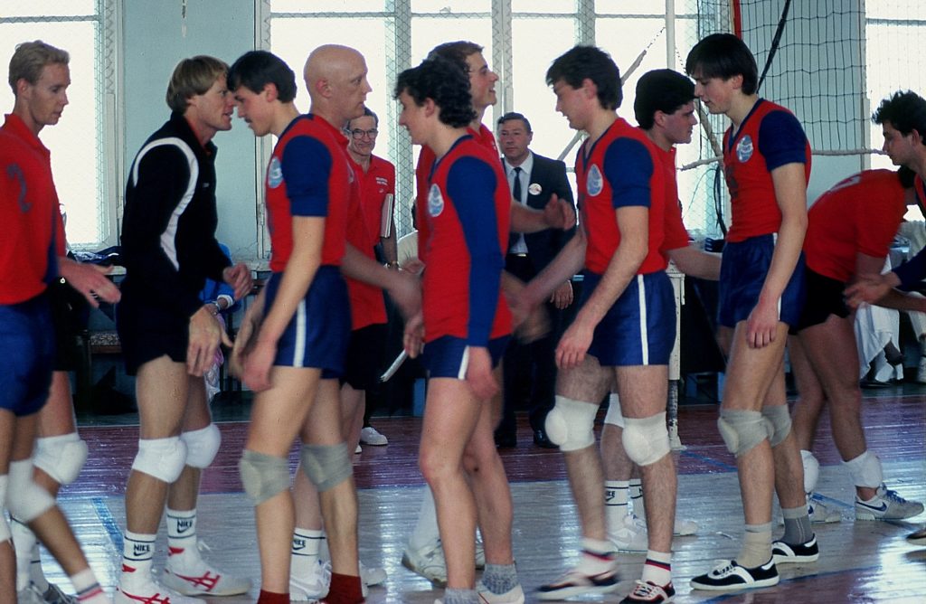 Douglas Grimes' (second from right) childhood dream came true, playing Soviet volleyball champs throughout the U.S.S.R. in 1987 (Douglas' dad is in the center near the window, wearing glasses). Photo credit: Douglas Grimes