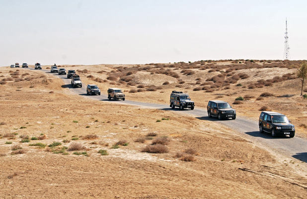 Land Rovers caravan through Turkmenistan along the Silk Road, once the exclusive domain of camels. Photo credit: Douglas Grimes