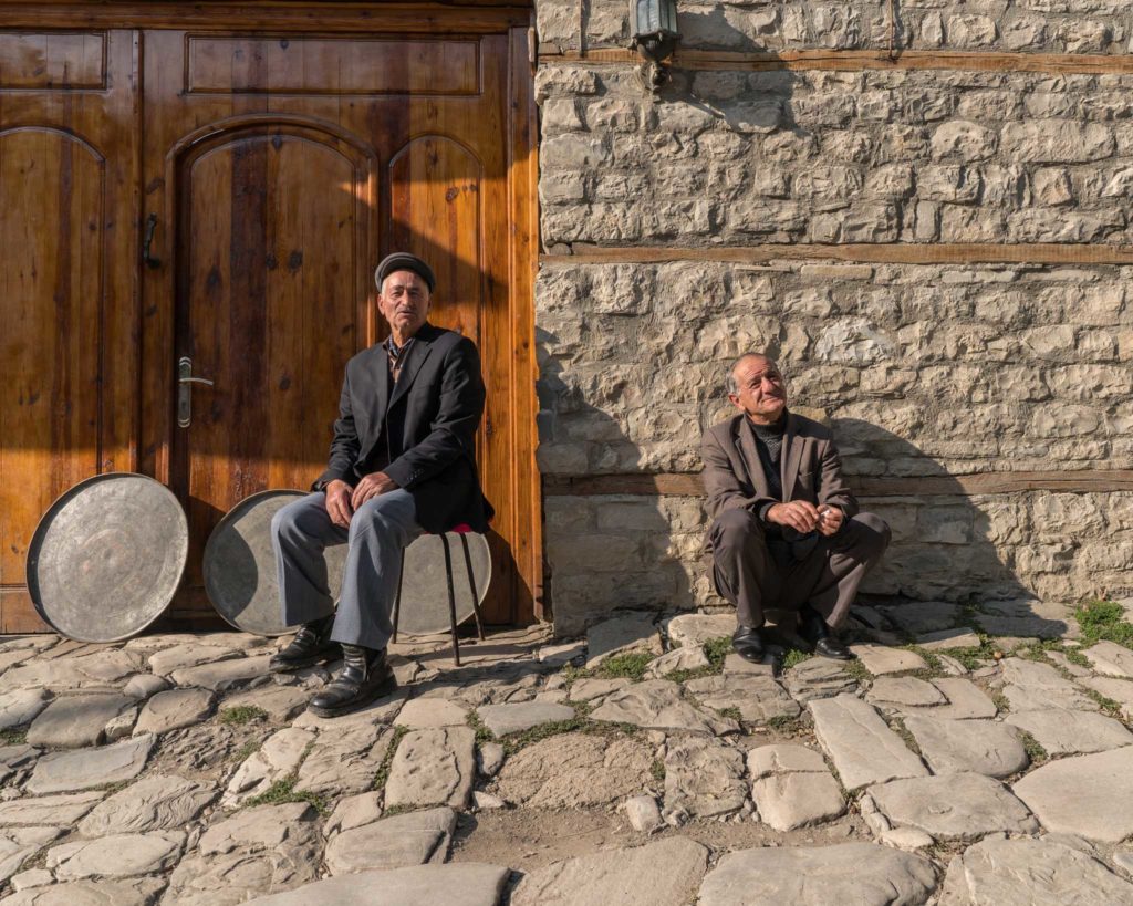 Locals taking a break on the cobblestone streets of Lahij village in Azerbaijan. Photo credit: Jered Gorman