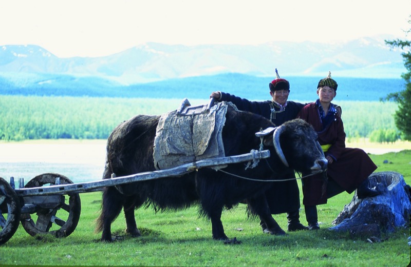 Locals pause for a photo op at Lake Hovsgol, Mongolia. Photo credit: Peter Guttman