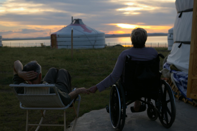 Author Jack Weatherford, pictured with his late wife, enjoy a Mongolian sunset. Photo credit: Susan Murphy