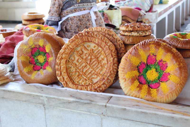 Specially-decorated breads grace the bazaars of Uzbekistan at Navruz. Photo credit: Willis Hughes