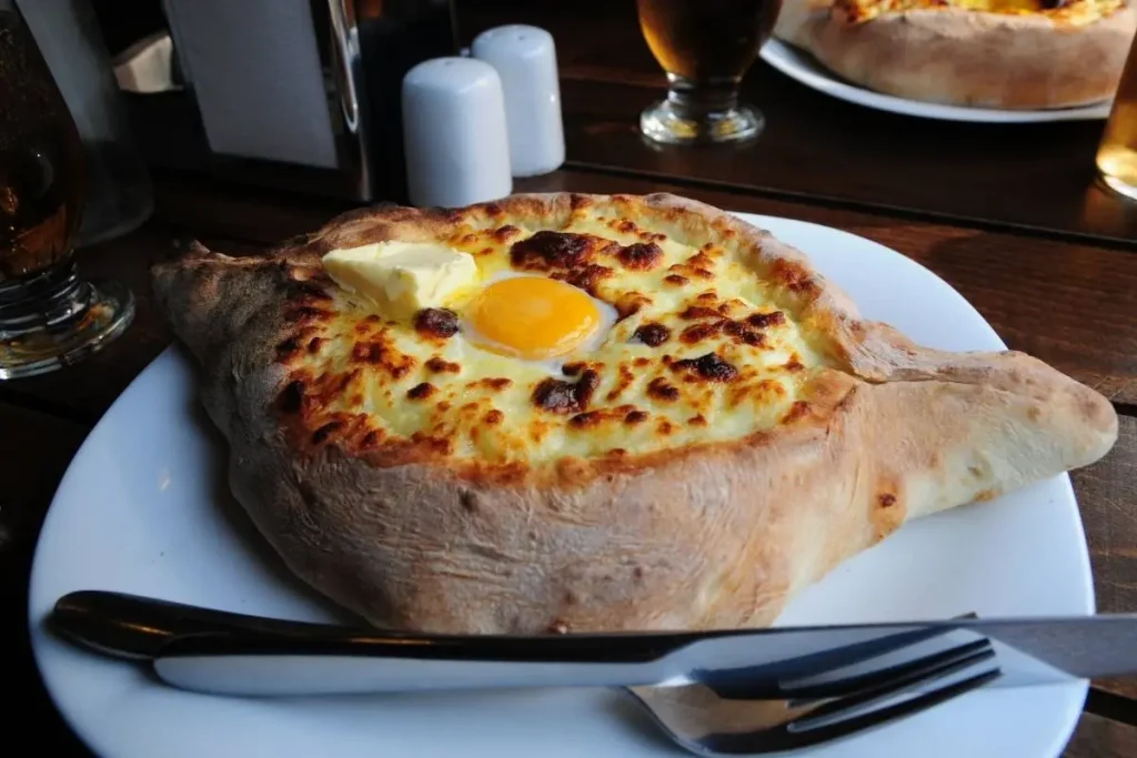 Traditional Georgian khachapuri with cheese and an egg, served warm. Image by MIR Corporation.


